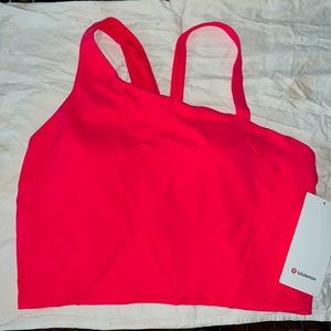 Lululemon. Asymmetrical/Cropped tank. Pink. Size 14